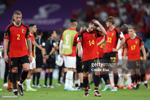 Toby Alderweireld and Dries Mertens of Belgium look dejected following their sides defeat after the FIFA World Cup Qatar 2022 Group F match between...