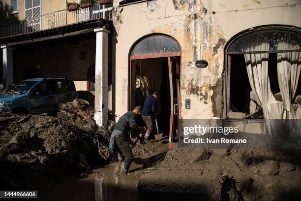 Volunteers clean up the mud after the landslide that hit Casamicciola on November 27, 2022 in Casamicciola Terme, Italy. Italian rescuers were...