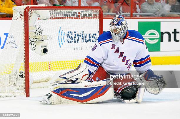 Henrik Lundqvist of the New York Rangers makes a save against the Washington Capitals in Game Four of the Eastern Conference Semifinals during the...