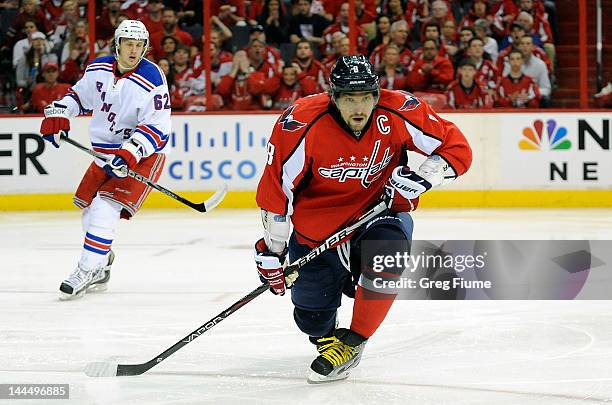 Alex Ovechkin of the Washington Capitals skates down the ice against the New York Rangers in Game Four of the Eastern Conference Semifinals during...