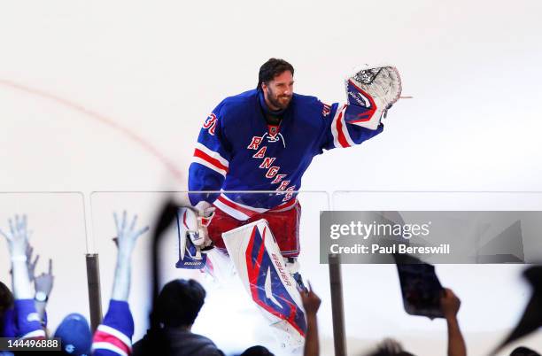 Henrik Lundqvist of the New York Rangers waves to the crowd after their 3 to 0 win over the New Jersey Devils in Game One of the Eastern Conference...