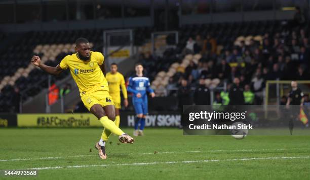 Adedeji Oshilaja of Burton Albion scores their sixth goal during the Emirates FA Cup Second Round match between Burton Albion and Chippenham Town at...