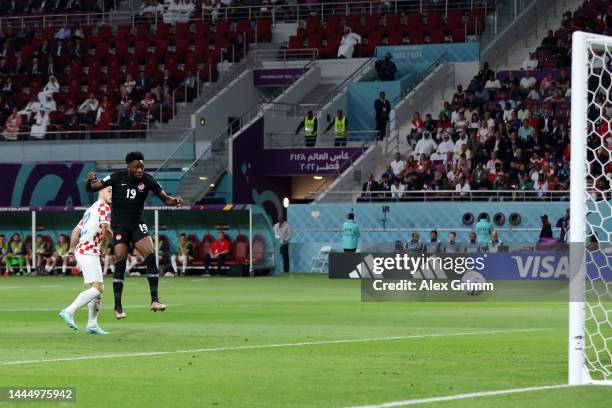 Alphonso Davies of Canada scores their team's first goal during the FIFA World Cup Qatar 2022 Group F match between Croatia and Canada at Khalifa...