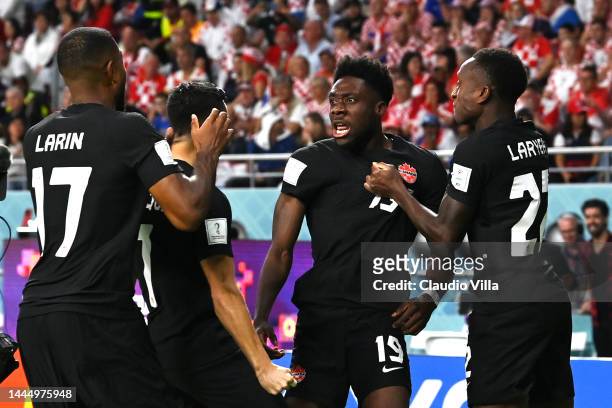 Alphonso Davies of Canada celebrates with teammates after scoring their team's first goal during the FIFA World Cup Qatar 2022 Group F match between...