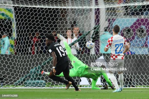 Alphonso Davies of Canada celebrates after scoring their team's first goal during the FIFA World Cup Qatar 2022 Group F match between Croatia and...