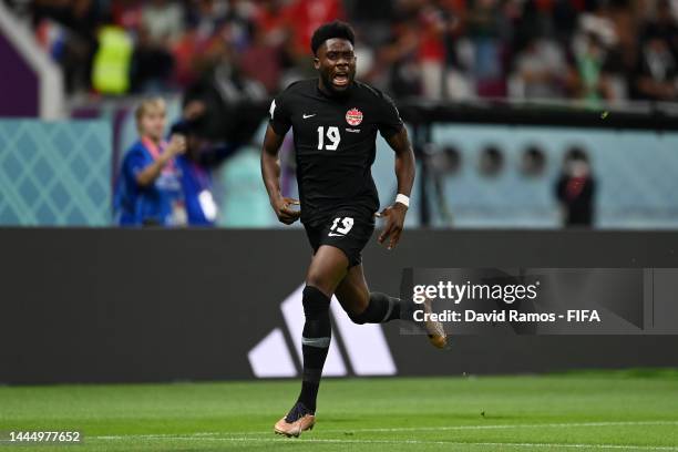 Alphonso Davies of Canada celebrates after scoring their team's first goal during the FIFA World Cup Qatar 2022 Group F match between Croatia and...