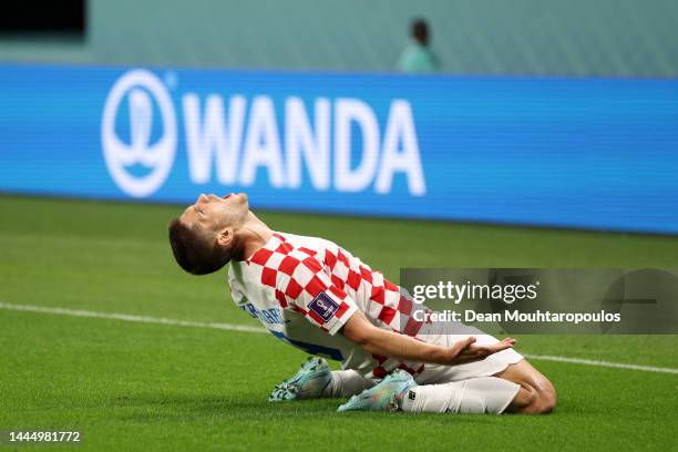 Andrej Kramaric of Croatia celebrates after scoring their team's first goal during the FIFA World Cup Qatar 2022 Group F match between Croatia and...