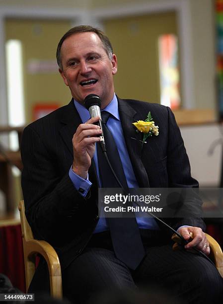 New Zealand Prime Minister John Key speaks to schoolchildren as he opens a new classroom block at the Westminister Christian School on May 15, 2012...