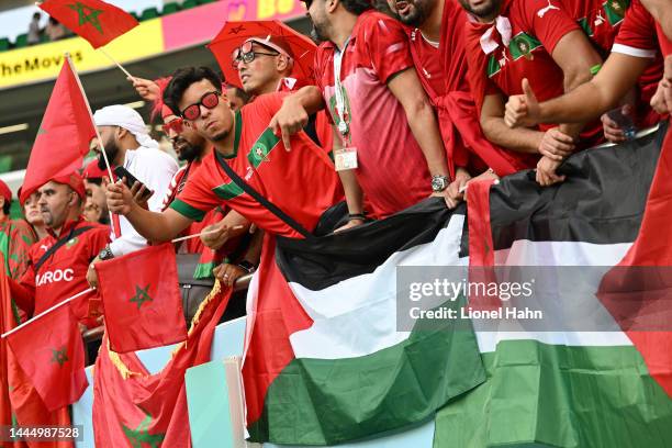 Fans of Morocco show their support to the Palestinian flag during the FIFA World Cup Qatar 2022 Group F match between Belgium and Morocco at Al...