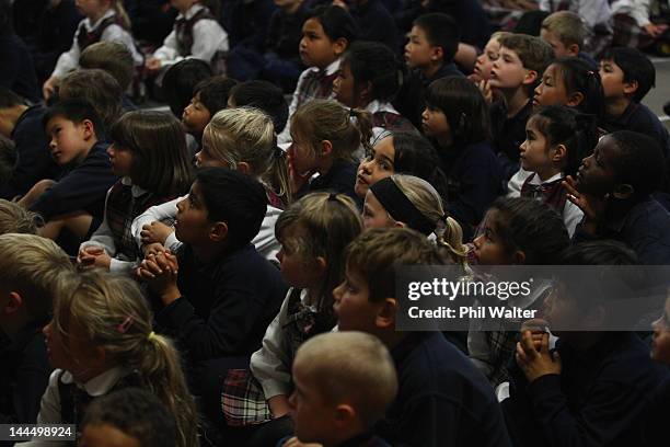 Schoolchildren listen to New Zealand Prime Minister John Key as he opens a new classroom block at the Westminister Christian School on May 15, 2012...