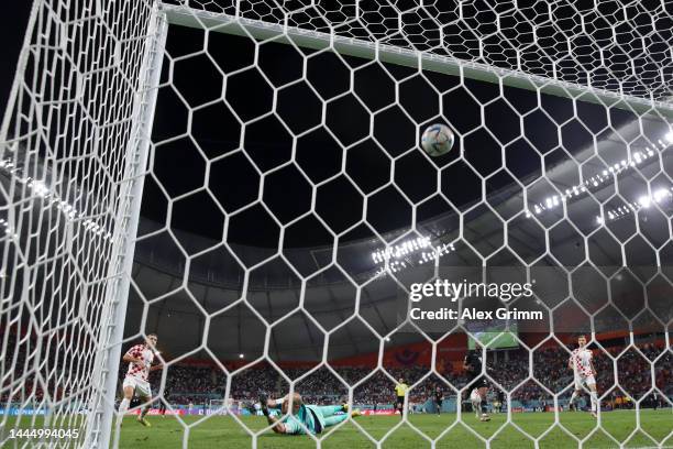 Lovro Majer of Croatia scores their team's fourth goal past Milan Borjan of Canada during the FIFA World Cup Qatar 2022 Group F match between Croatia...