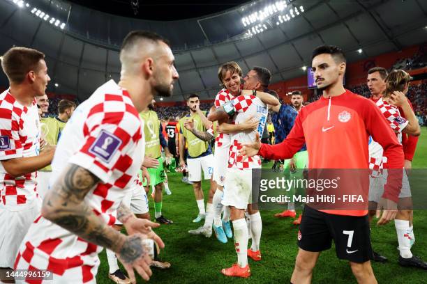 Luka Modric of Croatia celebrates with teammates after the 4-1 win during the FIFA World Cup Qatar 2022 Group F match between Croatia and Canada at...