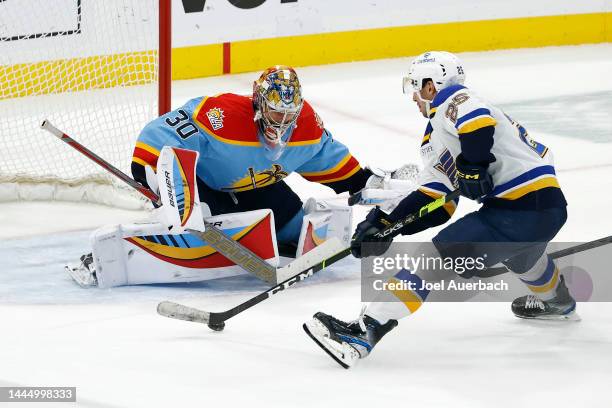 Jordan Kyrou of the St Louis Blues skates in to score the game winning goal against goaltender Spencer Knight of the Florida Panthers in overtime at...