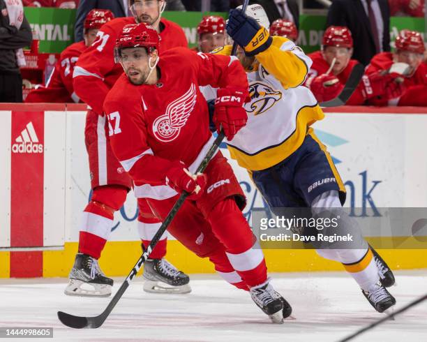 David Perron of the Detroit Red Wings turns up ice against the Nashville Predators during the third period of an NHL game at Little Caesars Arena on...