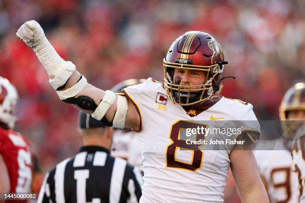 Thomas Rush of the Minnesota Golden Gophers holds up the 4th down sign during the game against the Wisconsin Badgers at Camp Randall Stadium on...