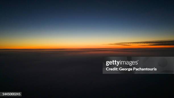 aerial photo of  sunrise above the clouds - sunrise ストックフォトと画像