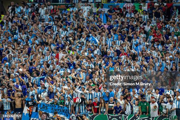 Argentina fans celebrate in the stands during the FIFA World Cup Qatar 2022 Group C match between Argentina and Mexico at Lusail Stadium on November...