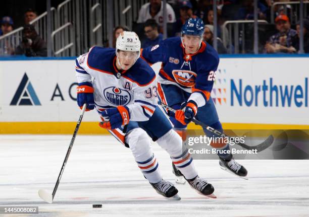 Ryan Nugent-Hopkins of the Edmonton Oilers skates against the New York Islanders at the UBS Arena on November 23, 2022 in Elmont, New York.
