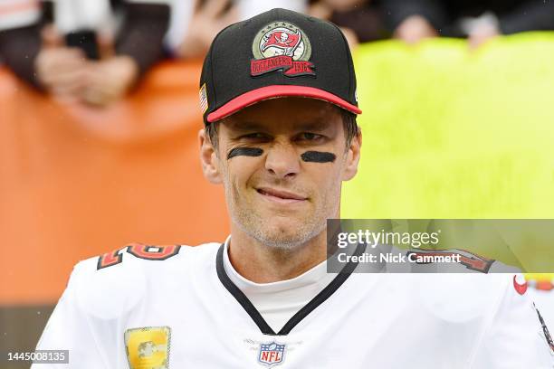 Tom Brady of the Tampa Bay Buccaneers warms up before a game against the Cleveland Browns at FirstEnergy Stadium on November 27, 2022 in Cleveland,...