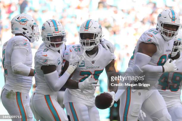 Xavien Howard of the Miami Dolphins celebrates after a touchdown during the first half in the game against the Houston Texans at Hard Rock Stadium on...