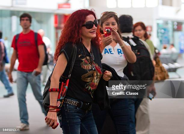 Celia Lora and Chela Lora walk in the terminal 2 of the international airport Benito Juarez on May 11, 2012 Mexico City, Mexico.