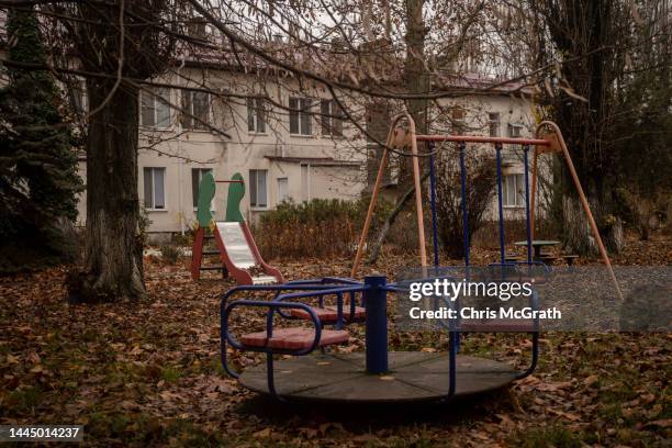 The overgrown playground of the Kherson Children's house where Russian forces allegedly took 46 children from, is seen on November 27, 2022 in...