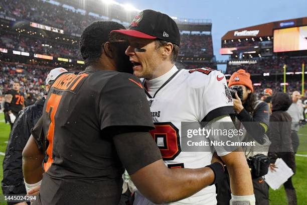 Tom Brady of the Tampa Bay Buccaneers and Jacoby Brissett of the Cleveland Browns talk after a game at FirstEnergy Stadium on November 27, 2022 in...