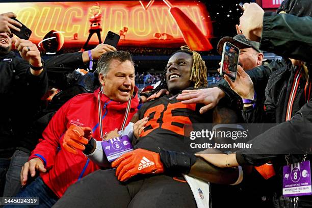 David Njoku of the Cleveland Browns celebrates with fans after a game against the Tampa Bay Buccaneers at FirstEnergy Stadium on November 27, 2022 in...