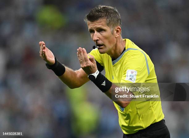 Referee Daniele Orsato gestures during the FIFA World Cup Qatar 2022 Group C match between Argentina and Mexico at Lusail Stadium on November 26,...