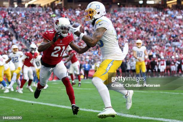 Keenan Allen of the Los Angeles Chargers catches a touchdown pass as Trayvon Mullen of the Arizona Cardinals defends in the second quarter at State...