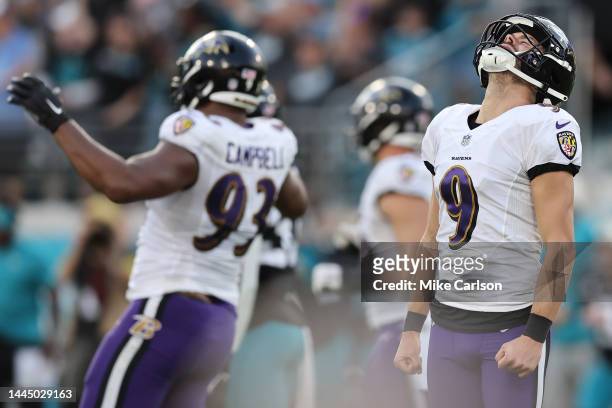 Justin Tucker of the Baltimore Ravens reacts after a missed field goal during the fourth quarter in the game against the Jacksonville Jaguars at TIAA...