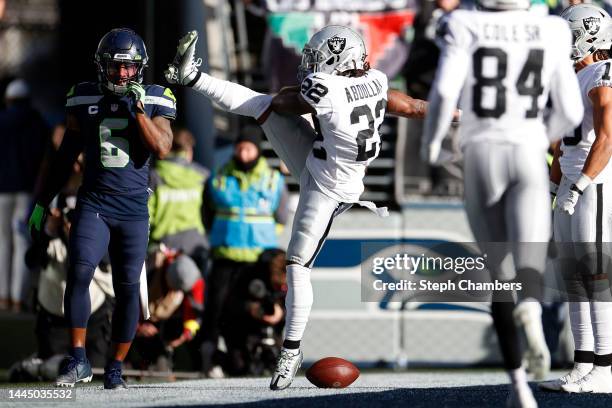 Ameer Abdullah of the Las Vegas Raiders celebrates a touchdown during the first half in the game against the Seattle Seahawks at Lumen Field on...