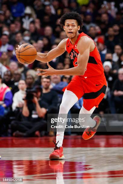 Jeff Dowtin Jr. #20 of the Toronto Raptors dribbles during the second half of an NBA game against the Brooklyn Nets at Scotiabank Arena on November...