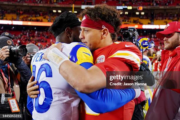 Patrick Mahomes of the Kansas City Chiefs and Bryce Perkins of the Los Angeles Rams embrace after a game at Arrowhead Stadium on November 27, 2022 in...