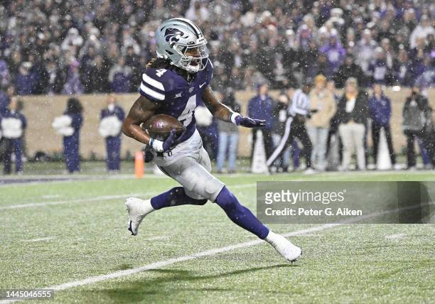 Wide receiver Malik Knowles of the Kansas State Wildcats returns a kick-off during the first half against the Kansas Jayhawks at Bill Snyder Family...