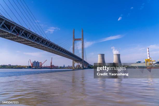 power plant beside the huangpu river,shanghai,china - kyltråg bildbanksfoton och bilder