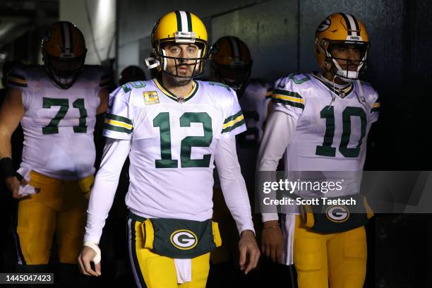 Aaron Rodgers and Jordan Love of the Green Bay Packers walk to the field before the game against the Philadelphia Eagles at Lincoln Financial Field...