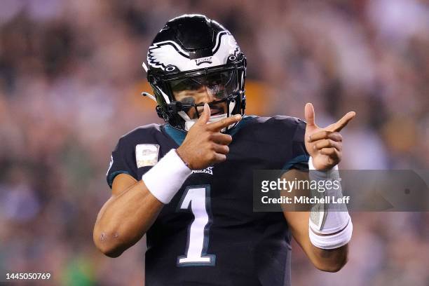 Jalen Hurts of the Philadelphia Eagles celebrates after a 4-yard rushing touchdown by Kenneth Gainwell during the first quarter against the Green Bay...