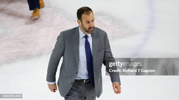 Head coach Jay Pandolfo of the Boston University Terriers walks at center ice after a game against the Notre Dame Fighting Irish during NCAA men's...