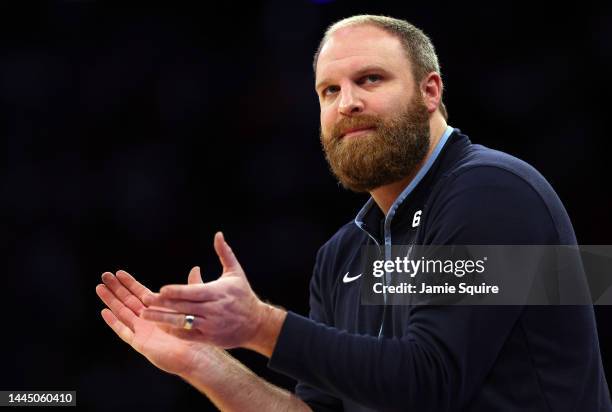 Head coach Taylor Jenkins of the Memphis Grizzlies claps from the bench during the game against the New York Knicks at Madison Square Garden on...