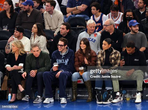 Christine Taylor, Ben Stiller, Pete Davidson, Emily Ratajkowski, Jordin Sparks and Dana Isaiah watch the action during the game between the Memphis...