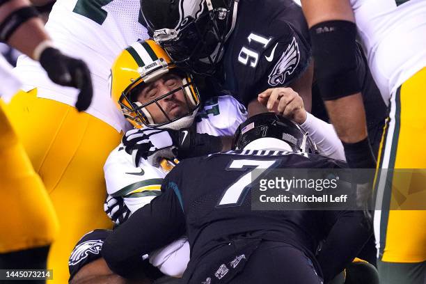 Aaron Rodgers of the Green Bay Packers is sacked by Brandon Graham of the Philadelphia Eagles during the third quarter at Lincoln Financial Field on...