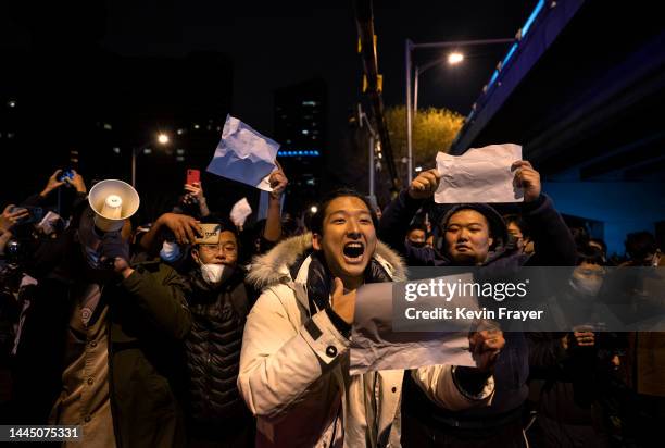 Protester shouts slogans against China's strict zero COVID measures on November 28, 2022 in Beijing, China. Protesters took to the streets in...