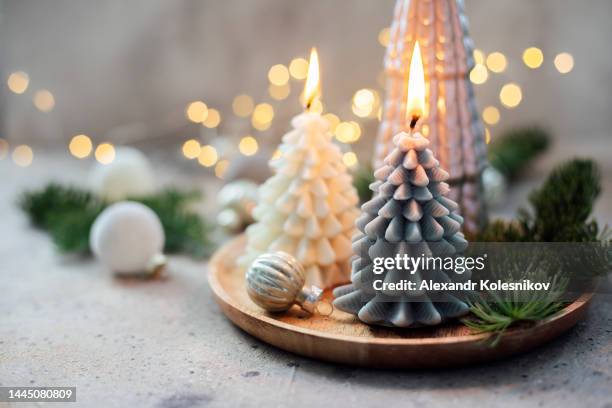 wooden tray with burning candles shape of christmas tree. christmas, winter, new year concept. - christmas candles stock-fotos und bilder