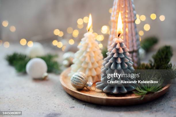 wooden tray with burning candles shape of christmas tree. christmas, winter, new year concept. - candela di natale foto e immagini stock