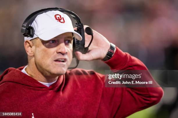 Advisor to Head Coach/Offensive Analyst Matt Wells of the Oklahoma Sooners looks on during the first half against the Texas Tech Red Raiders at Jones...