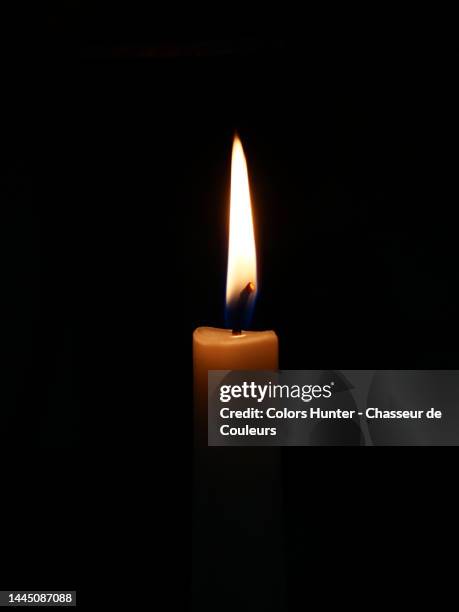 close-up of a candle and its flame in brussels - candle stock pictures, royalty-free photos & images