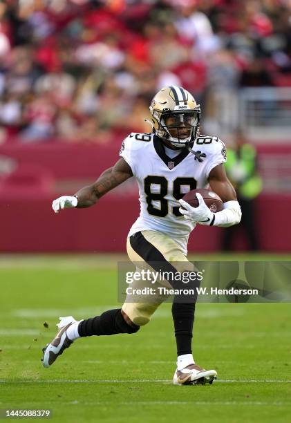 Rashid Shaheed of the New Orleans Saints runs with the ball after making a catch against the San Francisco 49ers during the third quarter of an NFL...