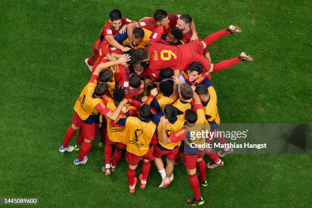 Alvaro Morata of Spain celebrates with teammates after scoring their team's first goal during the FIFA World Cup Qatar 2022 Group E match between...