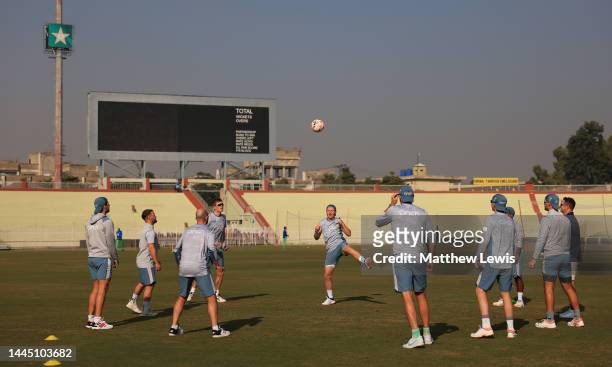 England players warm up during a practice during a Nets Session ahead of the First Test match at Rawalpindi Cricket Stadium on November 28, 2022 in...
